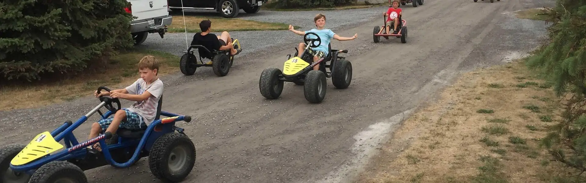 Group of kinds on pedal bikes